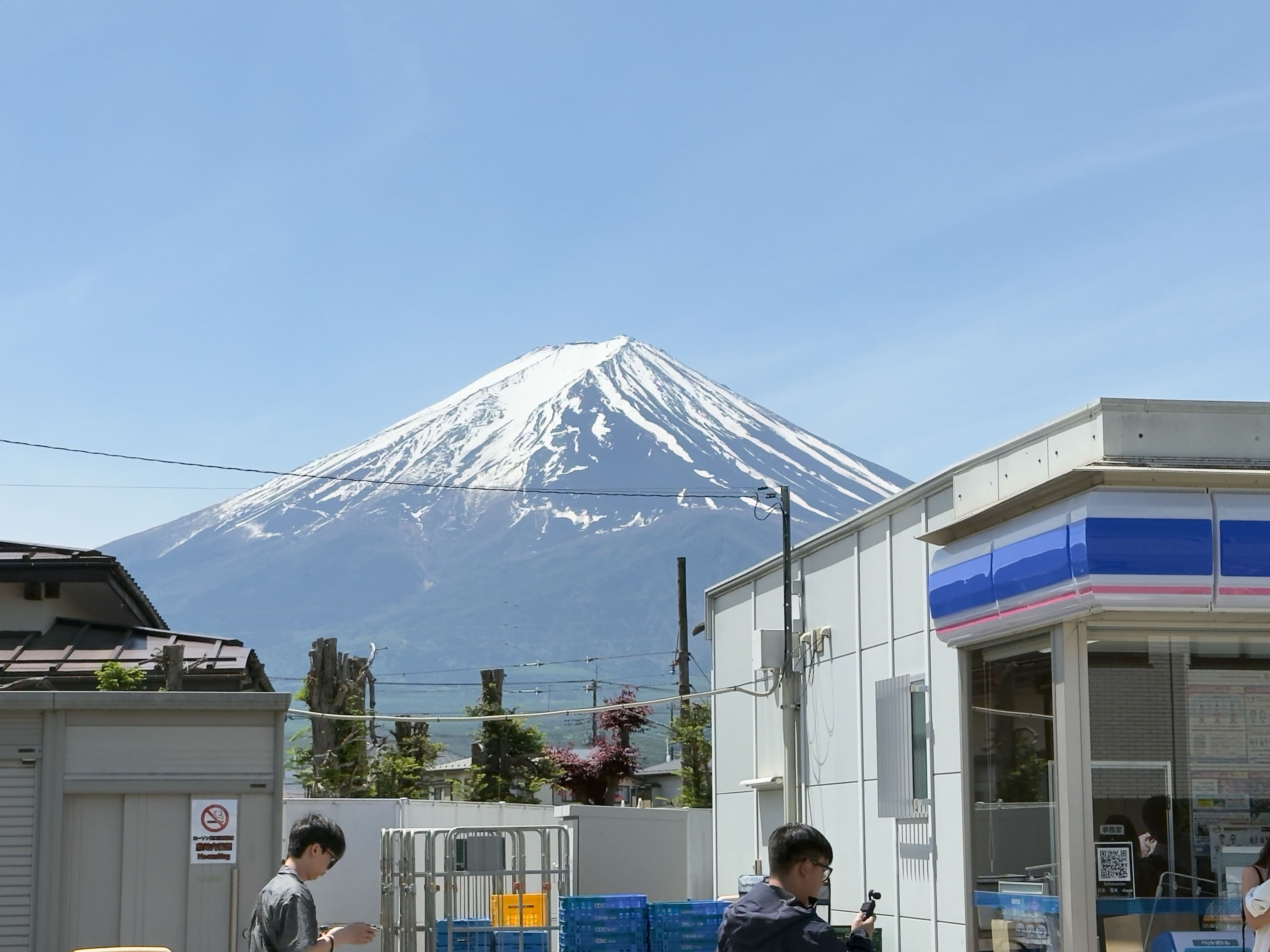 Mount Fuji snowcapped peak against a clear blue sky