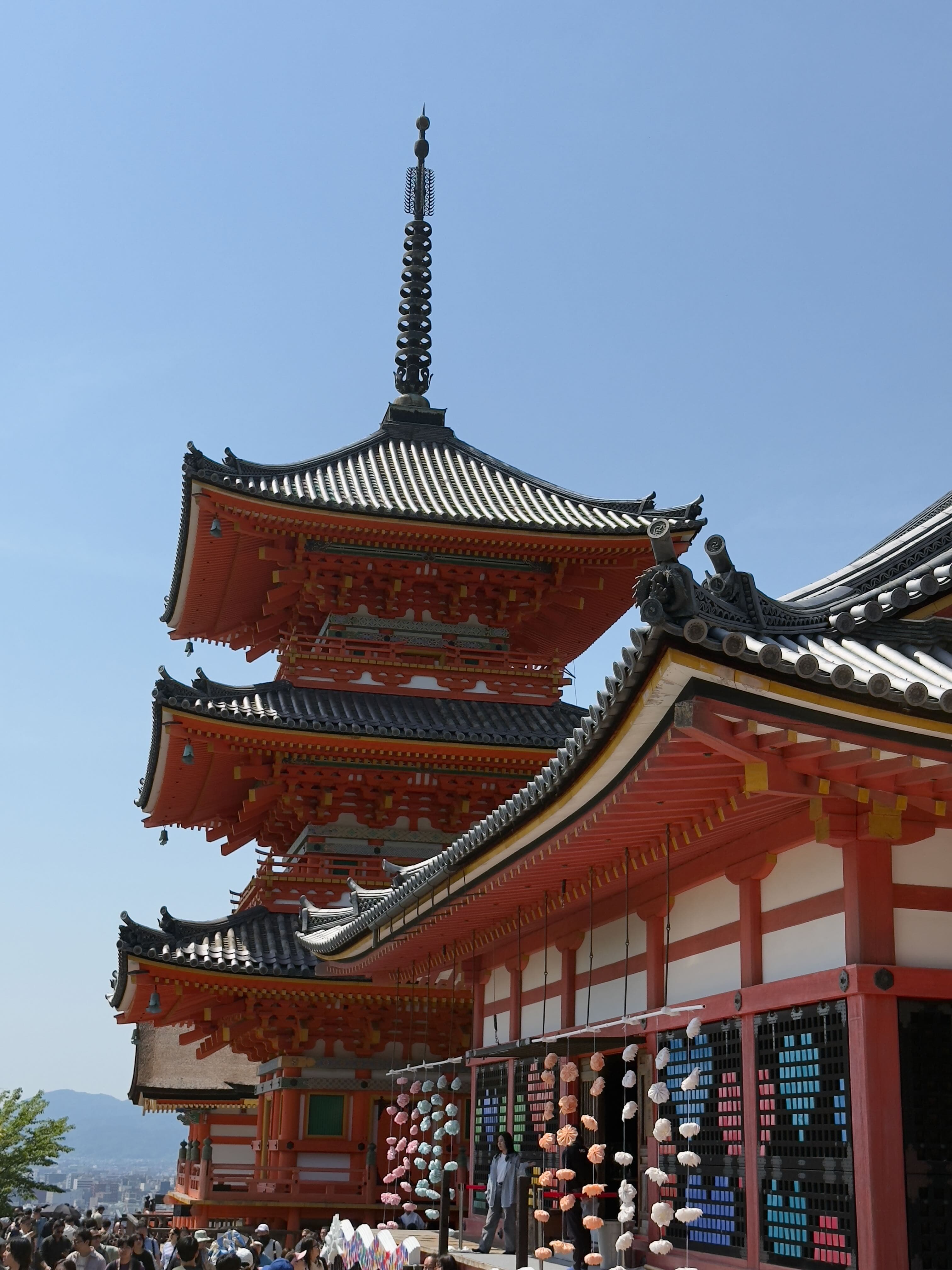 Stone-paved Ninenzaka lane lined with traditional wooden machiya buildings, Kyoto Japan