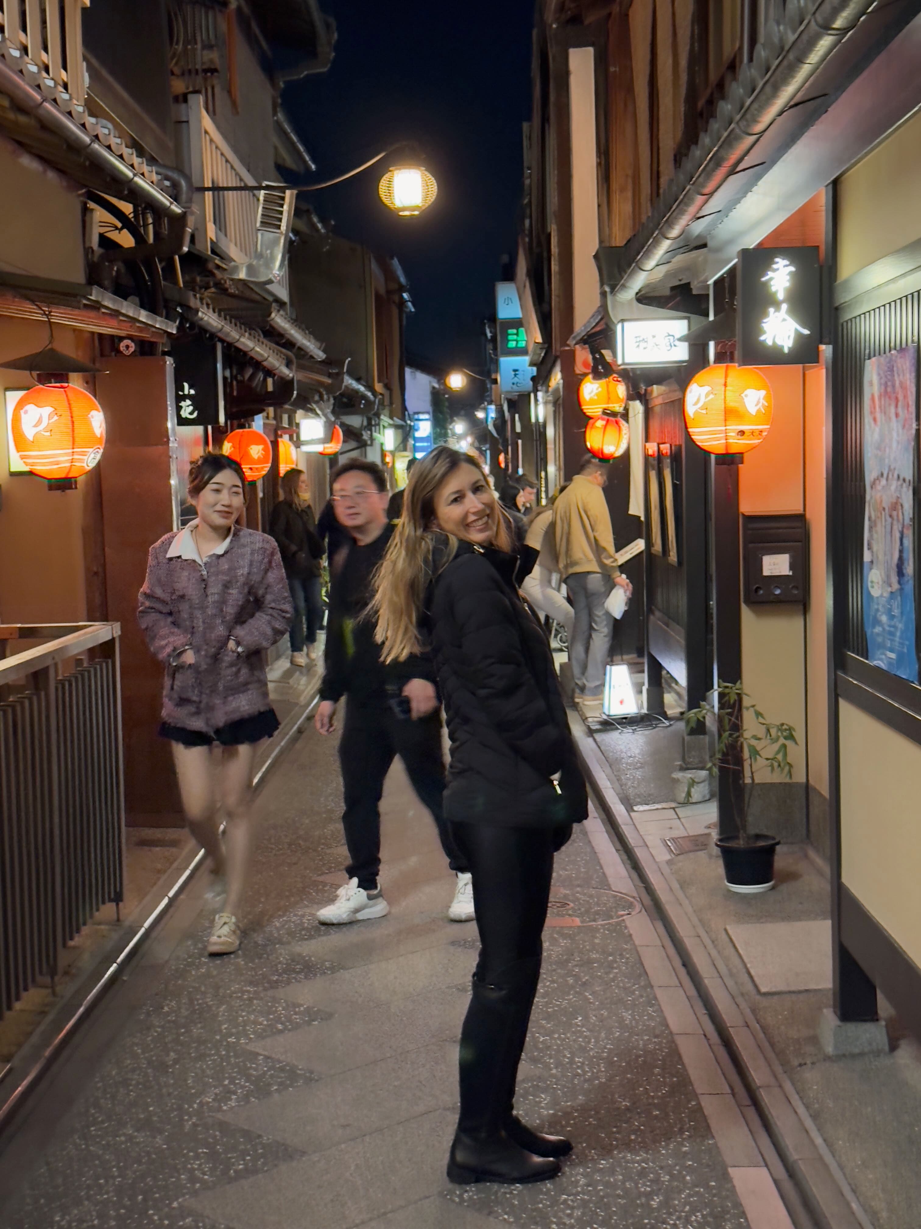 Narrow lantern-lit alleyway of Pontocho at night, Kyoto Japan