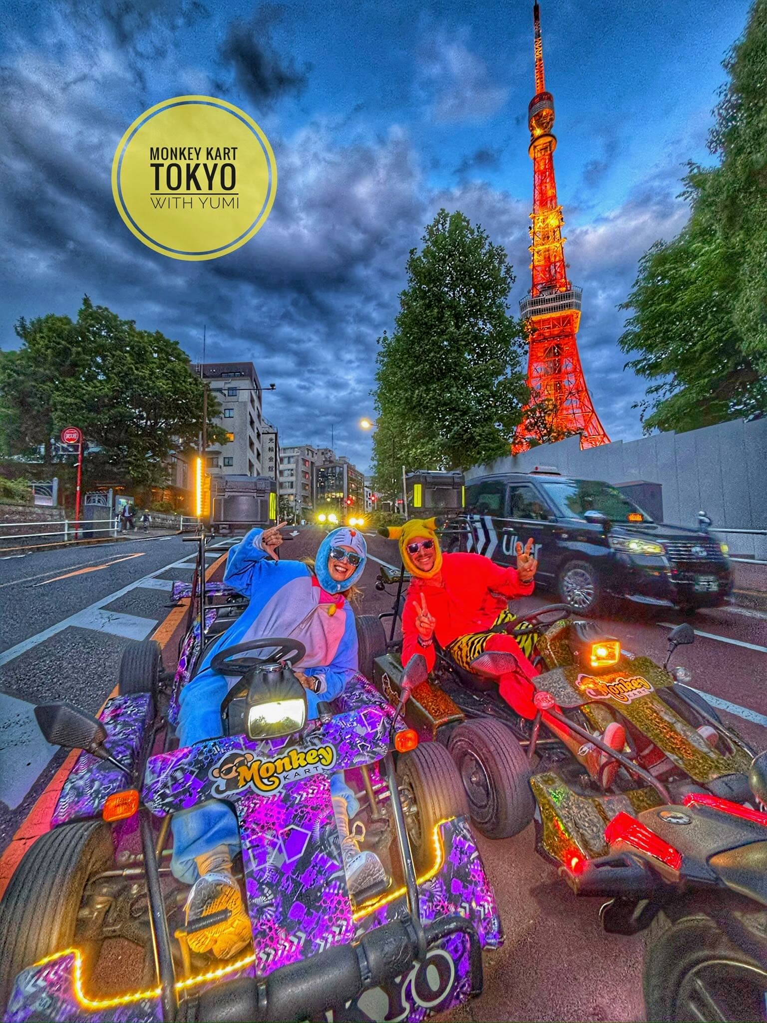 Group of go-kart riders in costumes stopped at traffic lights on public streets in Tokyo, Japan