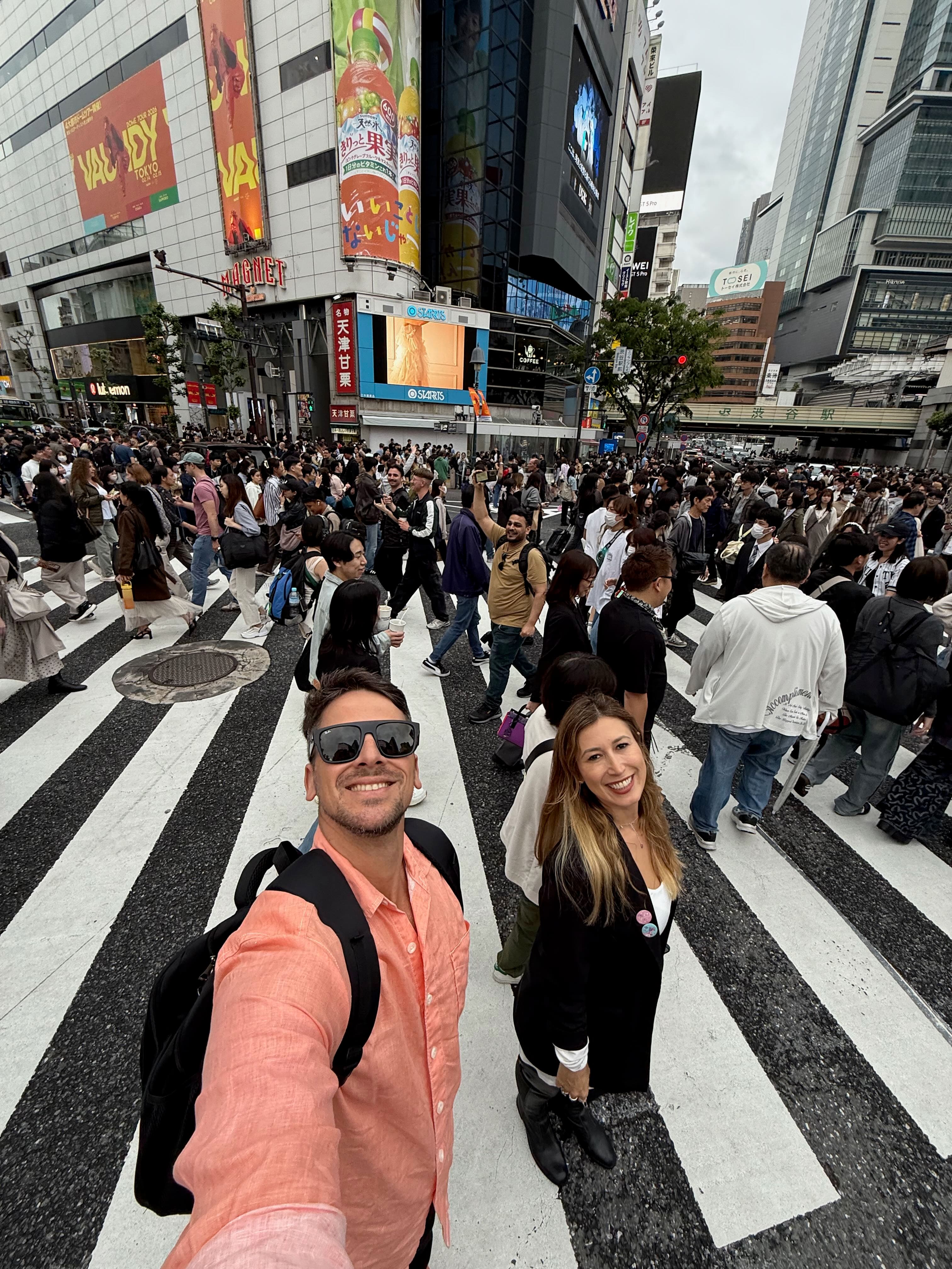 Shibuya scramble crossing packed with pedestrians crossing from all directions, Tokyo Japan
