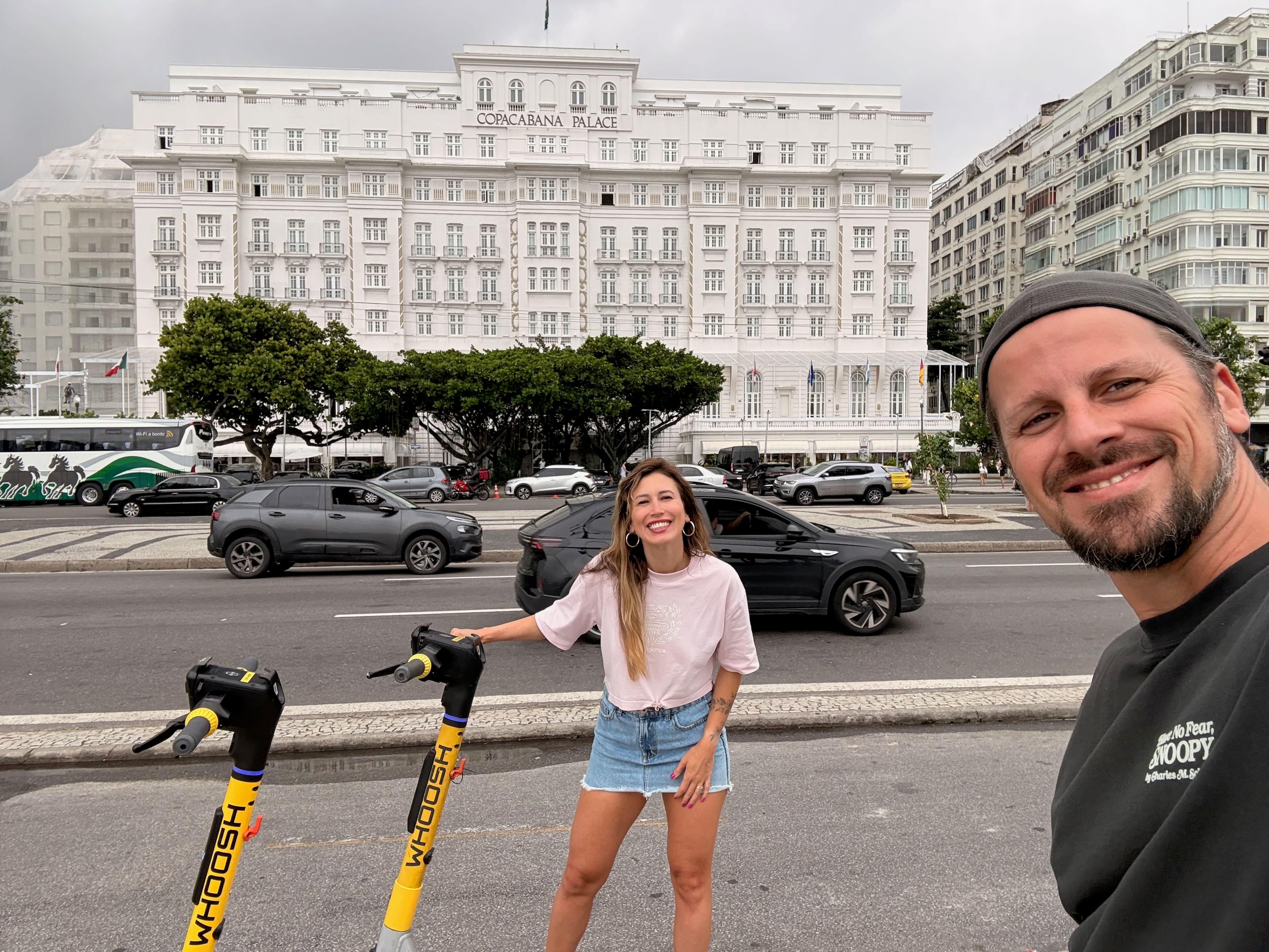 Scooter ride along Copacabana, Copacabana Palace hotel in background